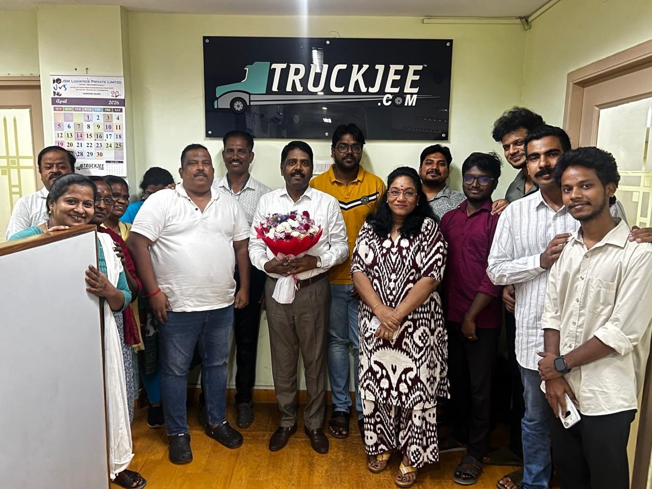 The JSM Logistics team celebrating a company milestone